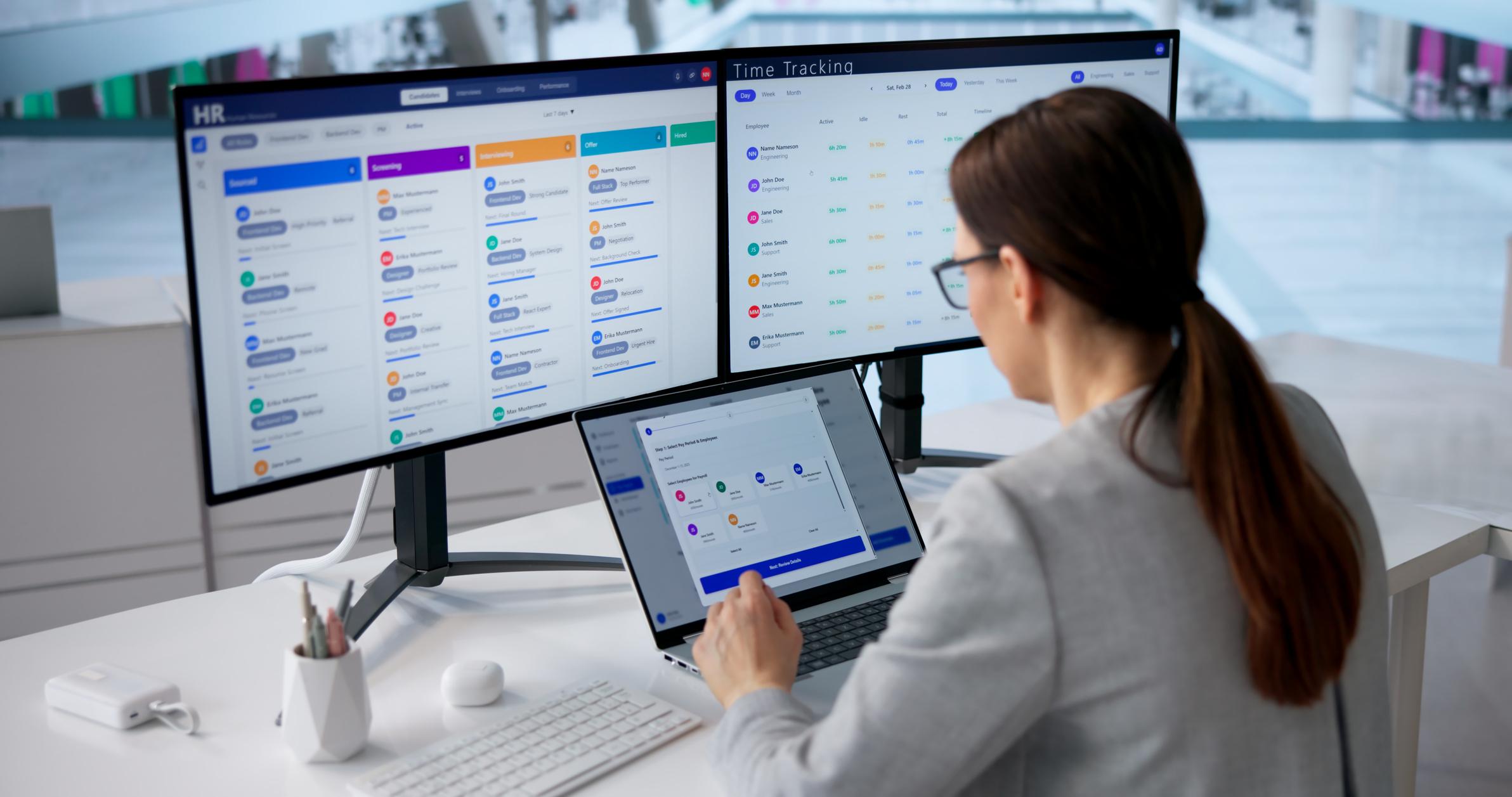 Recruiter managing a candidate pipeline board across screening, interviewing and offer stages